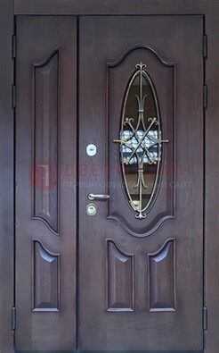 Темная металлическая дверь Винорит со стеклом и ковкой ДСК-239 в Волгограде