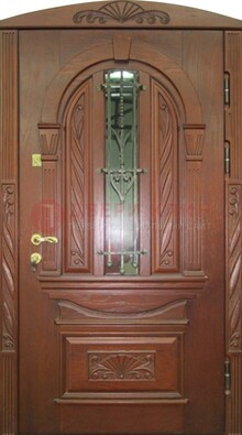 Узорная железная дверь массив со стеклом и ковкой ДСК-247 в Волгограде
